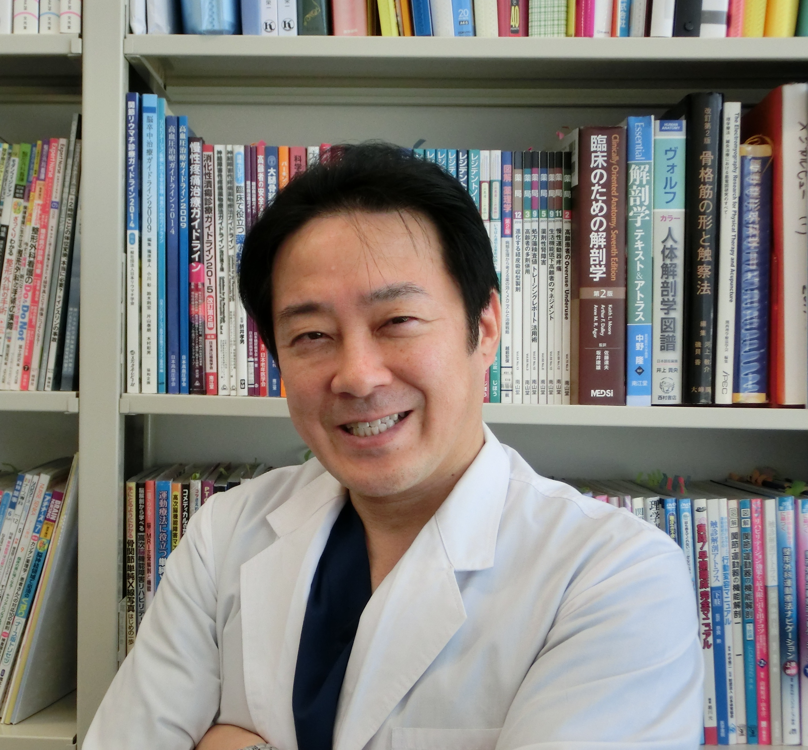 南場 芳文 氏